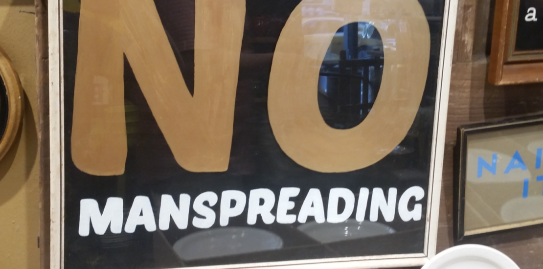 No Manspreading sign